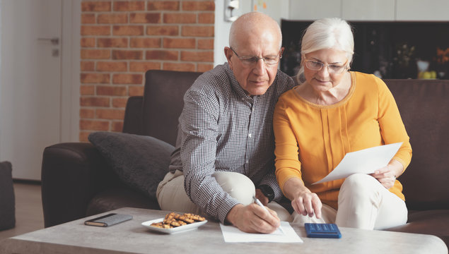 Senior Couple Paying Bills Together