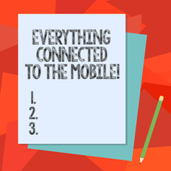 Text sign showing Everything Connected To The Mobile. Conceptual photo Online communications all in your device Stack of Blank Different Pastel Color Construction Bond Paper and Pencil