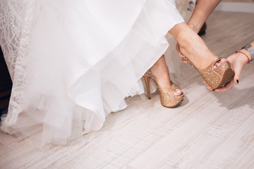 bride in wedding dress shoes. Bridesmaid shoes