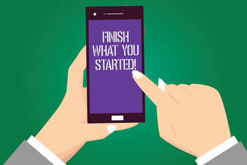 Handwriting text Finish What You Started. Concept meaning Do not stop until accomplish your goals Persistence Hu analysis Hands Holding Pointing Touching Smartphone Blank Color Screen