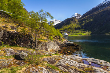 Famous Geiranger fiord in Norway. Spring time beautiful weather and colours.