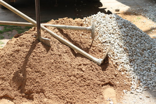 Pile of sand with hoe background