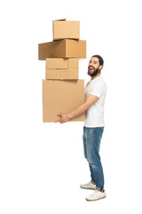 Fototapeta na wymiar cheerful latin man holding carton boxes and smiling isolated on white