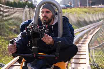 videographer at work on alpine coaster