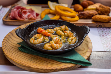 Plate of fried spiced prawns