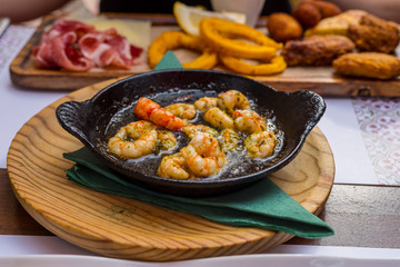 Plate of fried spiced prawns