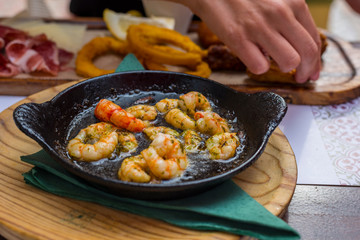 Plate of fried spiced prawns