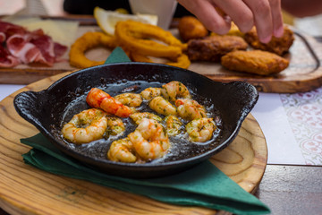 Plate of fried spiced prawns