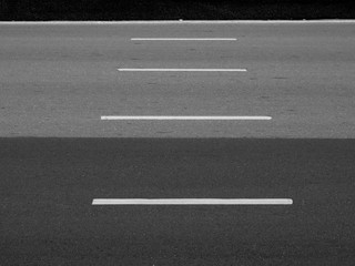 asphalt road with marking white line texture