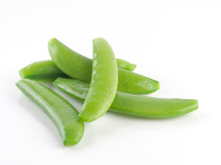 Closeup green peas fresh vegetable on white background, sugar snap pea