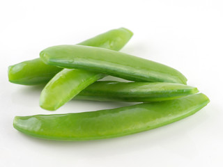 Closeup green peas fresh vegetable on white background, sugar snap pea