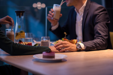 loving couple enjoying romantic dinner