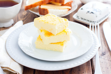lush omelette for breakfast on a white plate, horizontal