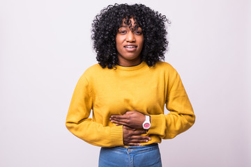 Sick black female with stomach ache isolated on a white background