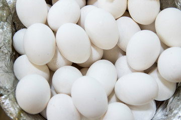 Background of fresh domestic eggs. Organic food