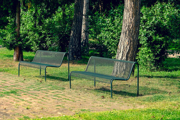 two empty benches in the park