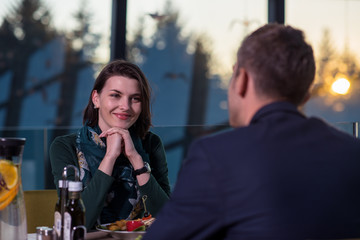 loving couple enjoying romantic dinner