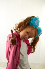 Girl with bows shows class and looks forward