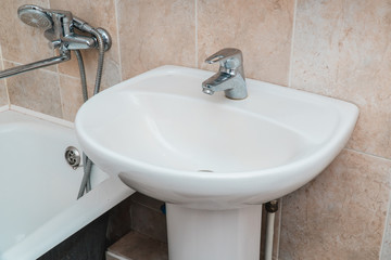 The photo of a sink in a bathroom