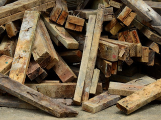 pile of old wood in construction site