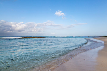 A sandy beach on the Caribbean Island of Barbados, taken with morning light