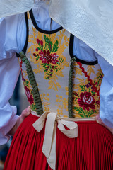 Fascinating beauty of the traditional sardinian costumes, still worn in villages across the island. Sardinia, Italy. - obrazy, fototapety, plakaty