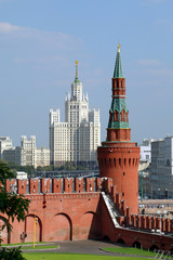 View of the Beklemishevskaya (Moskvoretskaya) tower and Stalin's high-rise building on Kotelnicheskaya embankment on a summer day in Moscow