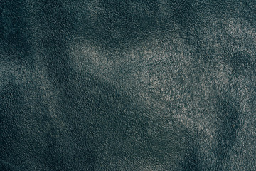 Texture of black leather. Old cracked skin. Genuine Leather. Spoiled jacket