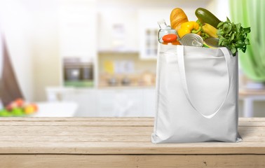 Shopping bag with groceries isolated on white background