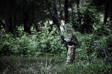military sniper hold on weapon