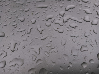 Water drops on the wall in the rainy season
