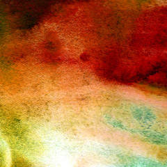 Abstract red and yellow colorful watercolor background. The color splashing in the paper. It is a hand drawn picture