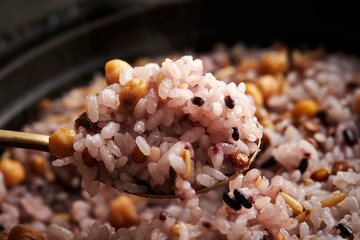 Steamed multi grain rice with spoon 