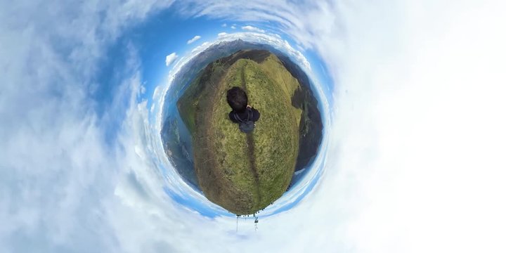 Trekking on the italian mountains overlooking Lake Como, tiny planet