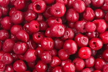 Frozen cherry fruit on a pile background