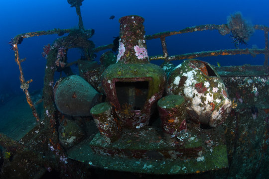 Boga shipwreck. The artificial reef. Underwater treasure. Diving, divers, wide angle underwater photography.
