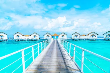 Fotobehang Beautiful tropical Maldives resort hotel and island with beach and sea © topntp