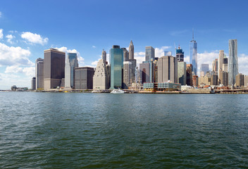 Fototapeta na wymiar Manhattan skyline at sunny day.