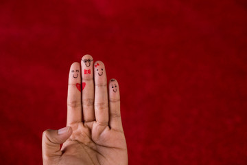 Red background and fingers and cute smile Art concept