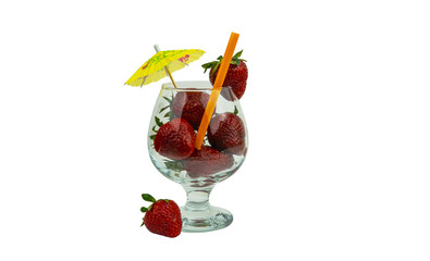 Fresh strawberry as a natural juice concept. Strawberry cocktail with tubule and umbrella.