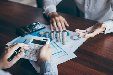 Business on meeting to planning finance analyzing calculate with report