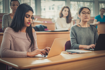 Multinational group of students in an auditorium