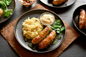 Grilled sausages with sauerkraut and horseradish