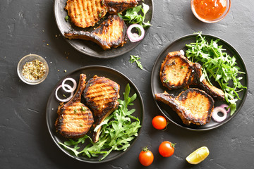 Grilled pork steaks