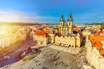 Buildings on the Old Town square Staromestska Namesti with Tyn Church in Prague, Czech Republic...