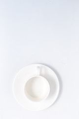 Empty cup of coffee on the table. Top view