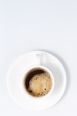A cup of black coffee on a white background.