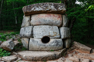 Ancient round compound dolmen in the valley of the river Jean, Monument of archeology megalithic...