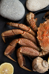 Claws of boiled horsehair crab or hairy crab, vertical shot, view from above, close-up