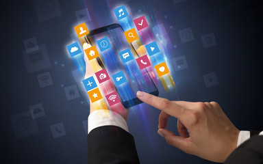 Female hand using smartphone with colorful angular fast switching application icons around